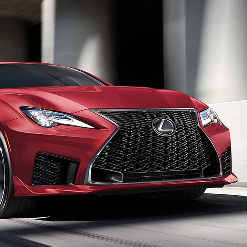 Lexus driving in the city